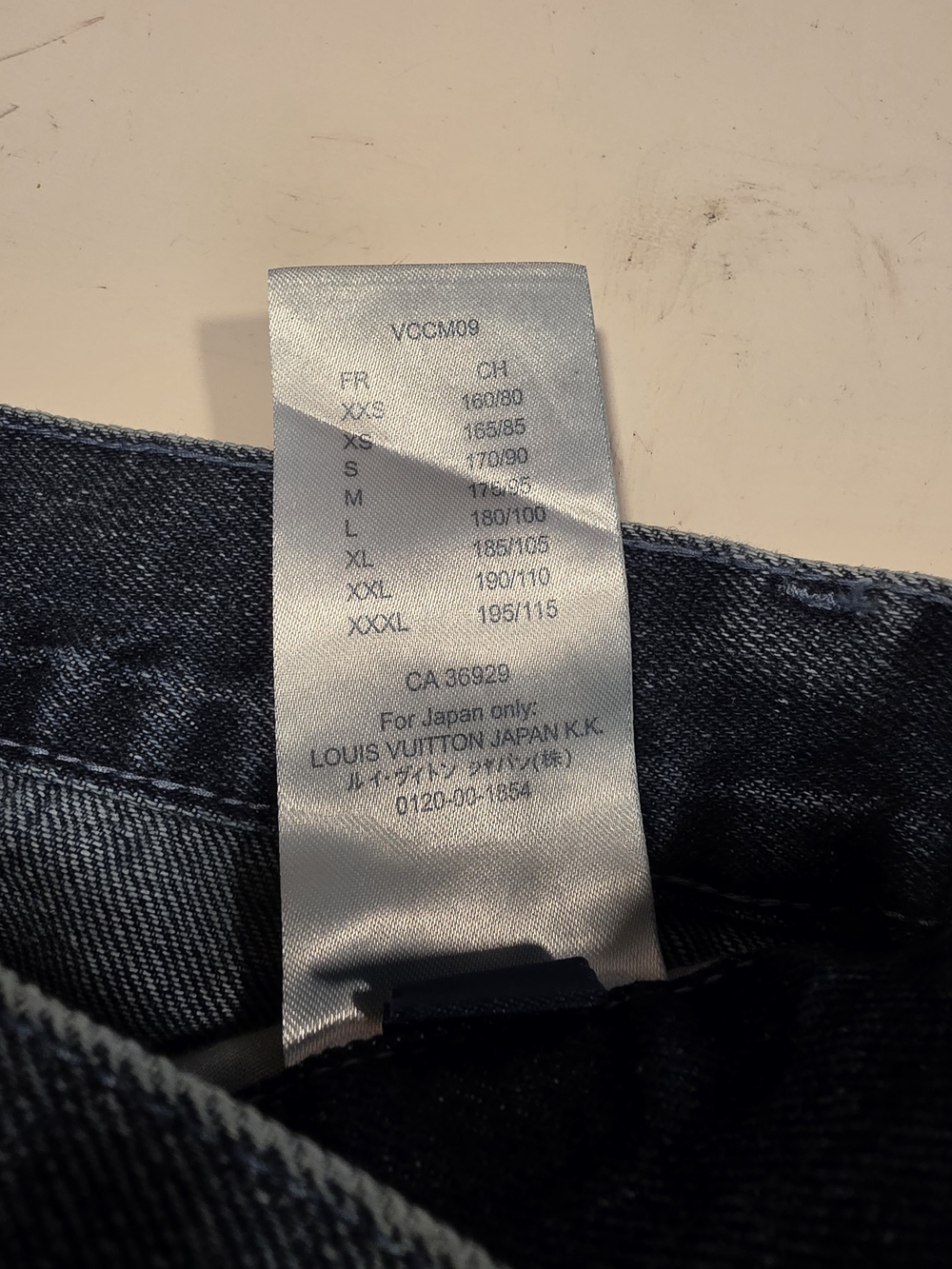 Louis Vuitton Denim Jacket Collar with Orange Logo on Dark Blue
